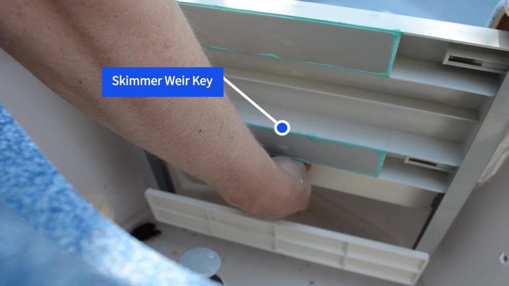 Step 4. Remove the skimmer weir by turning the key-