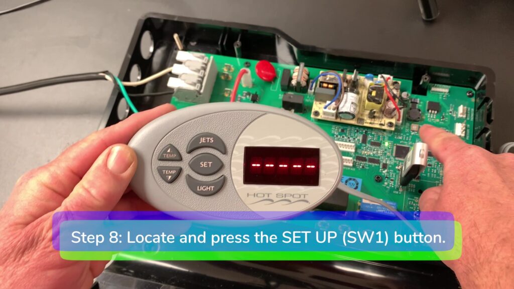 Step 8. Locate and press the SW1 button-