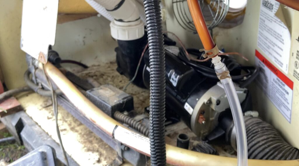 Step 9. Remove the heater hose-